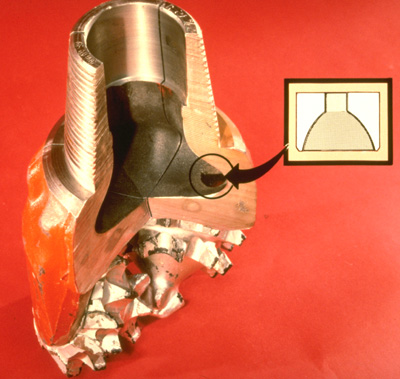 Photograph of roller-cone bit.